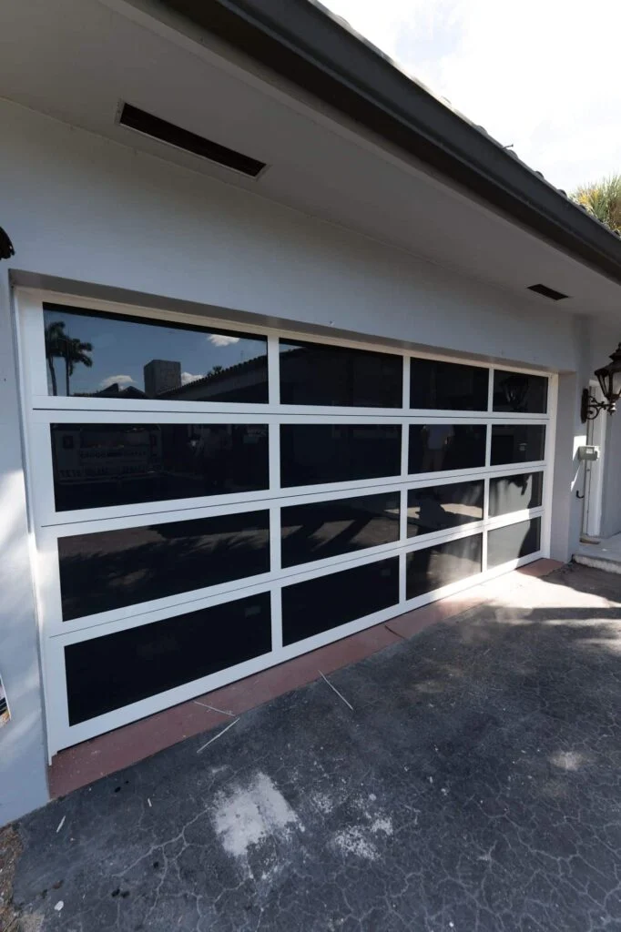 Dubai Framed aluminum-and-glass garage door installation detail